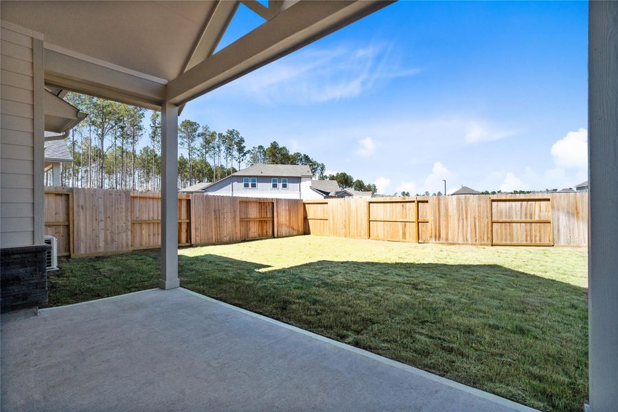 This beautifully defined backyard creates a clean, pristine canvas, ready for you to design and cultivate your ideal green space. This beautifully defined backyard creates a clean, pristine canvas, ready for you to design and cultivate your ideal green space.