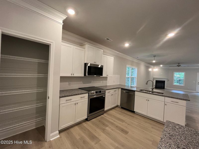 Furnished interior view inside a new home in Palmetto Creek, Bolivia (Image 6).