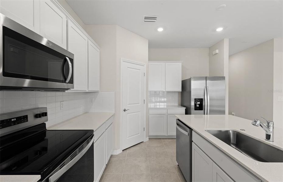 Furnished interior view inside a new home in The Strand at Cedar Grove, North Port (Image 10).