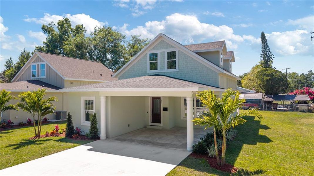 Front exterior of a new home in , Plant City, FL, highlighting curb appeal (Image 17).