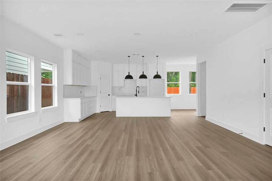 Elegant dining space adjacent to the kitchen and living areas. Elegant dining space adjacent to the kitchen and living areas.