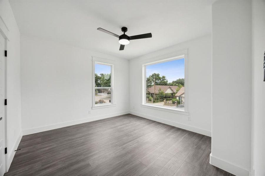 2nd floor bedroom room featuring abundant light and a ceiling fan