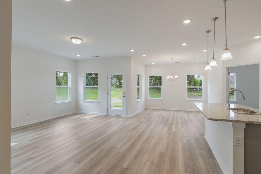 Open living area! Lots of windows to add in natural lighting! Open living area! Lots of windows to add in natural lighting!