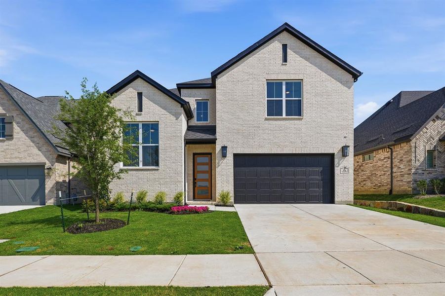 Front exterior of a new home in Hillside Village, Celina, TX, highlighting curb appeal (Image 2). Front exterior of a new home in Hillside Village, Celina, TX, highlighting curb appeal (Image 2).