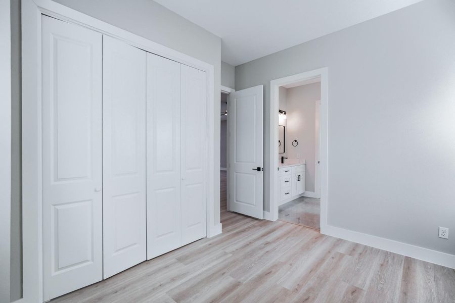 Comfortable guest bedroom with privacy and natural light