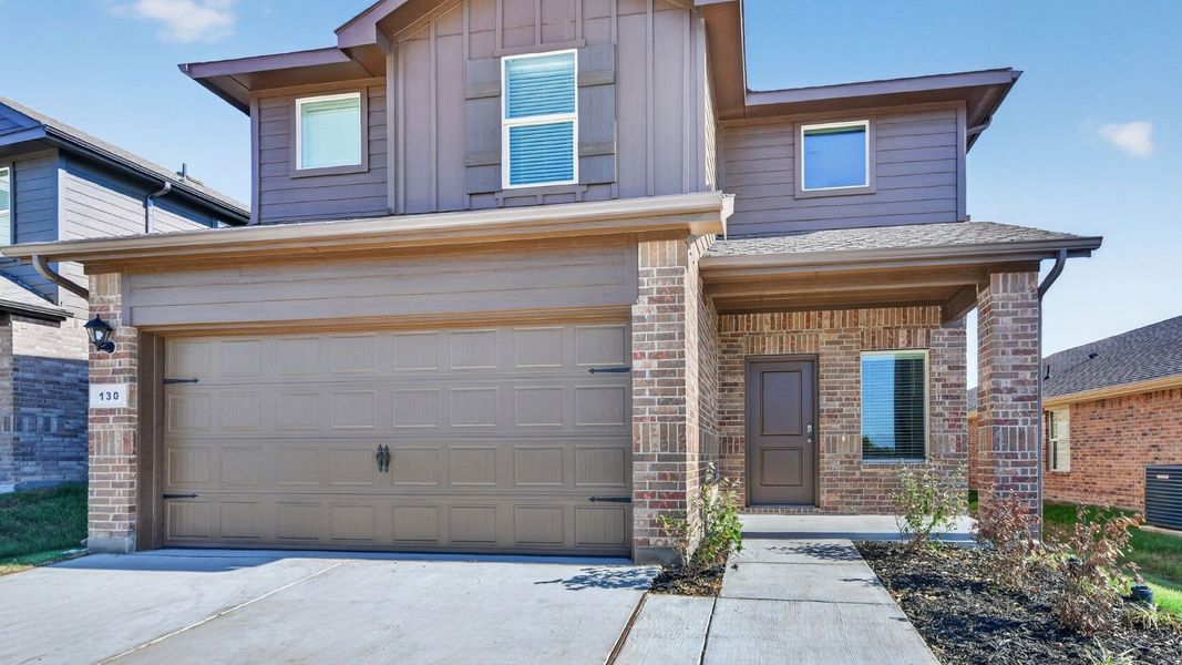 Representative exterior photo of a completed home built from the Renae by D.R. Horton in The Hills at Reunion, Newark, TX (Image 19).