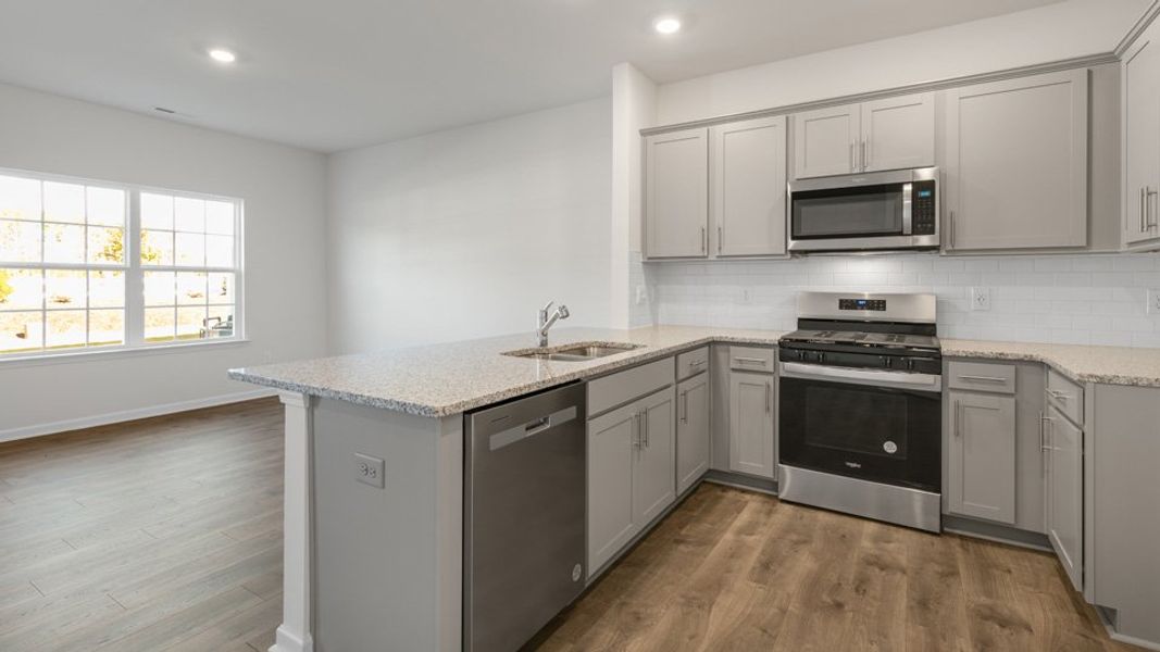 Furnished interior view inside a new home in Clock Road Townhomes, New Bern (Image 4).