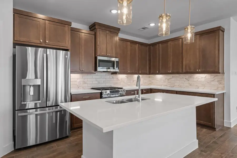 Furnished interior view inside a new home in Meridiana, Manvel (Image 5).