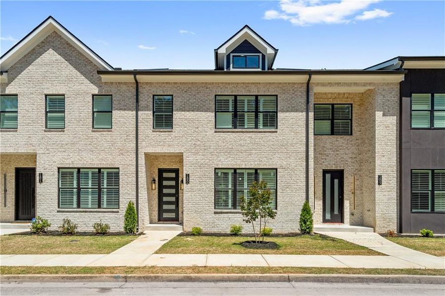 Front exterior of a new home in , Stockbridge, GA, highlighting curb appeal (Image 2). Front exterior of a new home in , Stockbridge, GA, highlighting curb appeal (Image 2).