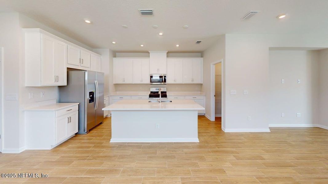 Furnished interior view inside a new home in RiverTown - Forest, St. Johns (Image 5).
