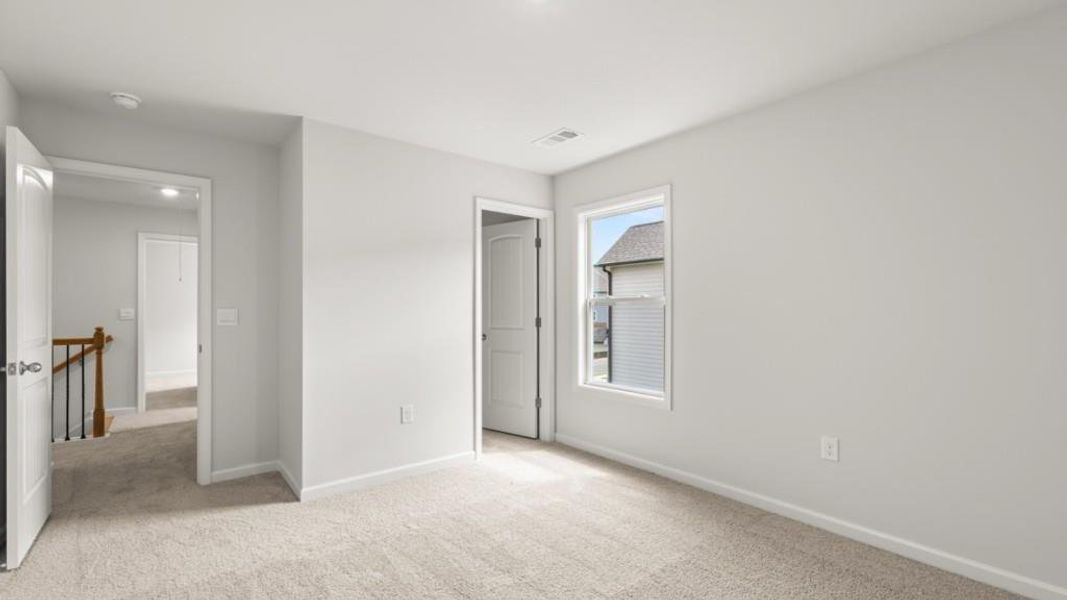 Spacious, unfurnished interior of a new home in Haven Abbey, Cumming (Image 30).