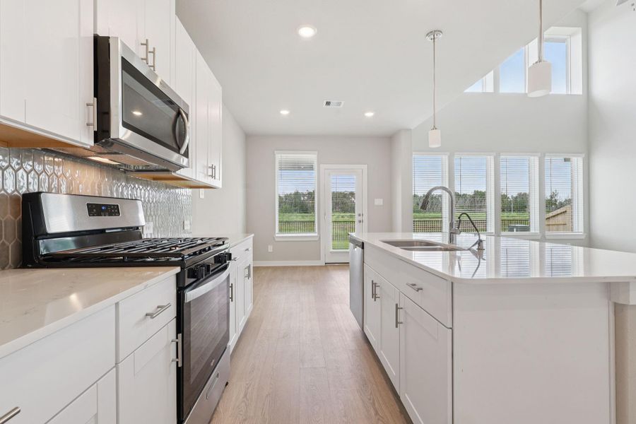 Photo is not of the actual home, but is an inspirational photo of builder’s model home and may depict options, furnishings, and/or decorator features that are not included