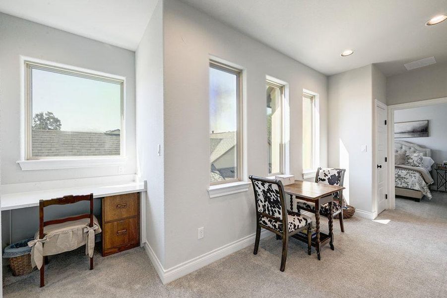 Upstairs landing with built in desk and room for a small 2nd living area Upstairs landing with built in desk and room for a small 2nd living area