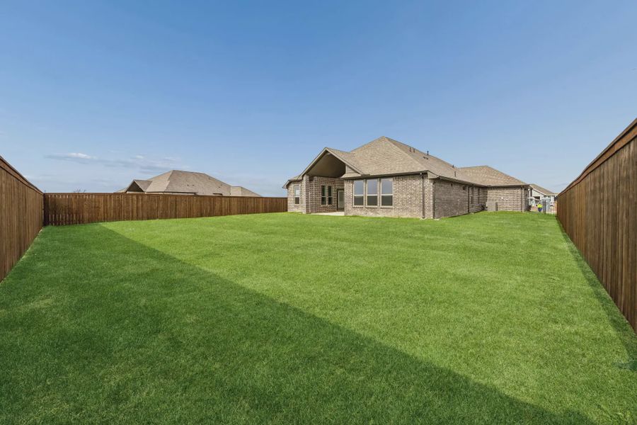 Exterior details and patio area of a home in Silo Mills, Joshua (Image 17).