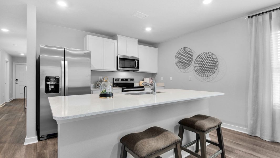 Representative furnished interior of a home built from the Delilah by D.R. Horton in Colonial East, Panama City Beach (Image 5).