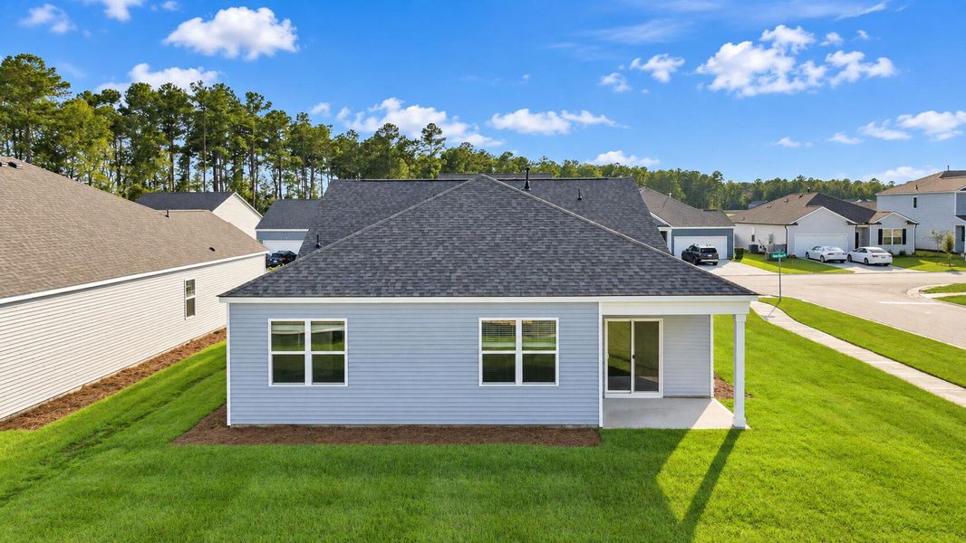Exterior details and patio area of a home in Pine Hills at Cane Bay, Summerville (Image 2). Exterior details and patio area of a home in Pine Hills at Cane Bay, Summerville (Image 2).