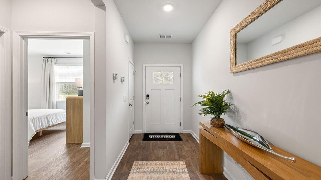 Furnished interior view inside a new home in Pine Hills at Cane Bay, Summerville (Image 13). Furnished interior view inside a new home in Pine Hills at Cane Bay, Summerville (Image 13).