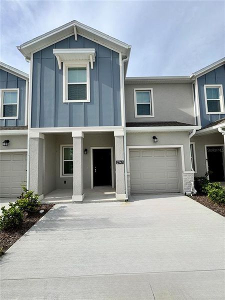 Front exterior of a new home in , Davenport, FL, highlighting curb appeal (Image 2). Front exterior of a new home in , Davenport, FL, highlighting curb appeal (Image 2).
