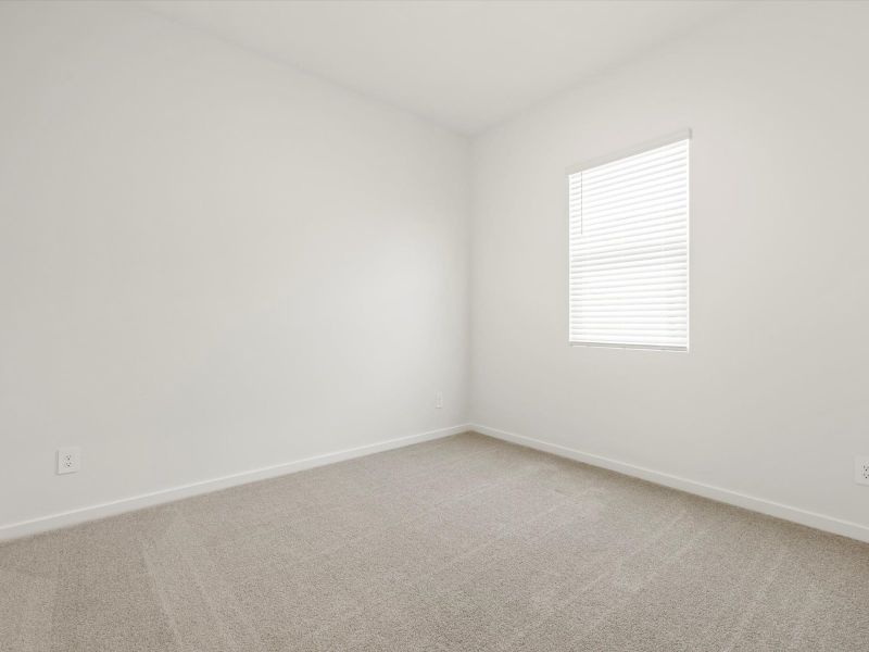 Spacious, unfurnished interior of a new home in White Tank Foothills Signature Series, Waddell (Image 10).