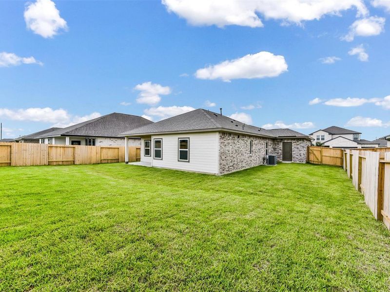 Exterior details and patio area of a home in River Ranch Meadows, Dayton (Image 24). Exterior details and patio area of a home in River Ranch Meadows, Dayton (Image 24).