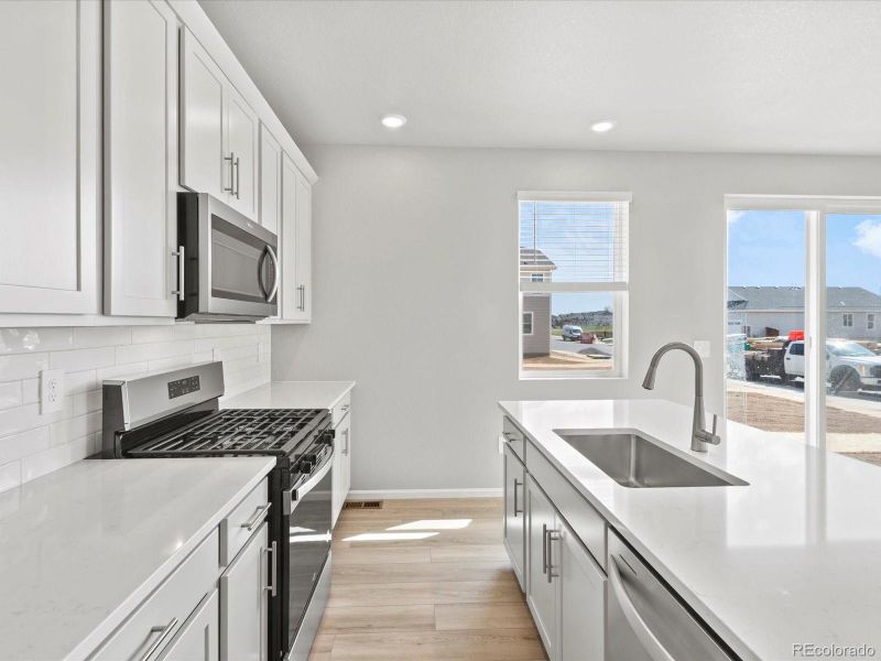 Furnished interior view inside a new home in Revere at Johnstown, Johnstown (Image 9).