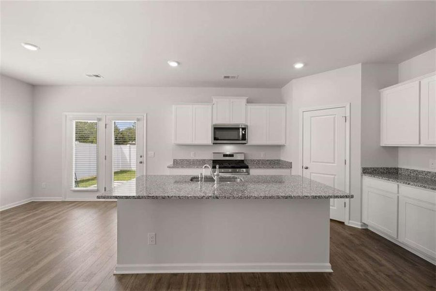 Furnished interior view inside a new home in Oakchase at Hampton, Hampton (Image 5).