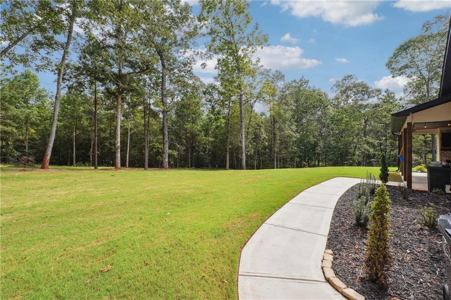 Front exterior of a new home in , Winston, GA, highlighting curb appeal (Image 2). Front exterior of a new home in , Winston, GA, highlighting curb appeal (Image 2).