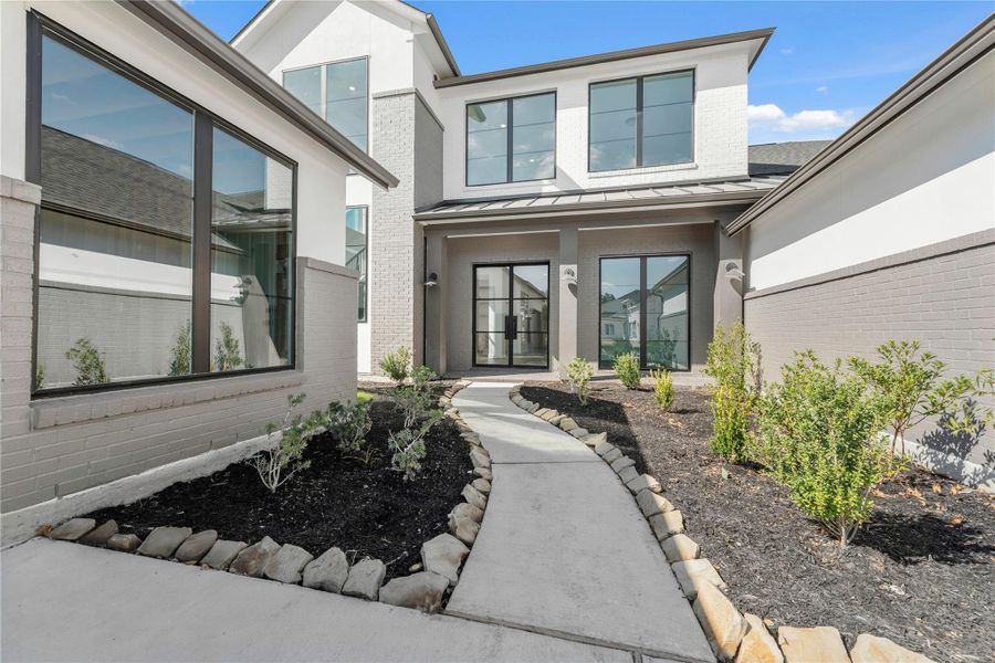 Exterior details and patio area of a home in ARTAVIA®, Conroe (Image 4).