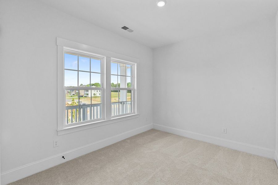 Spacious, unfurnished interior of a new home in Lilah Grove, Summerfield (Image 36).