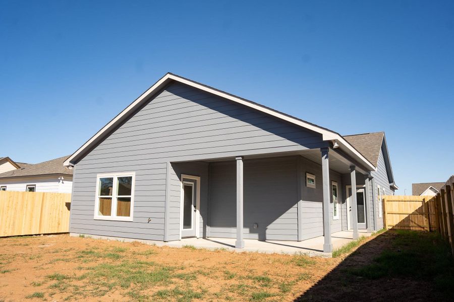 Exterior details and patio area of a home in , Smithville (Image 3).