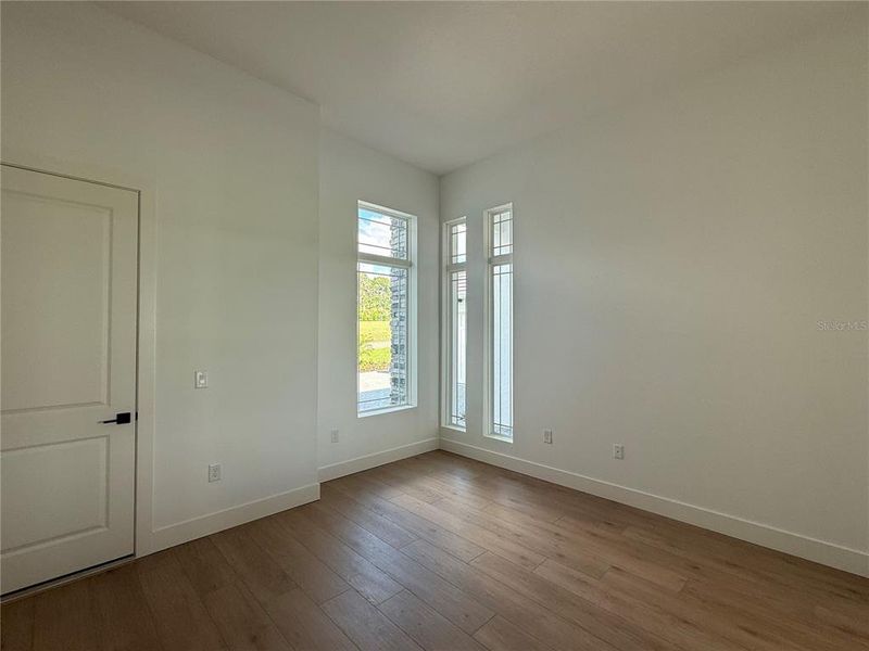 Spacious, unfurnished interior of a new home in West Hill Estates, Dade City (Image 24).