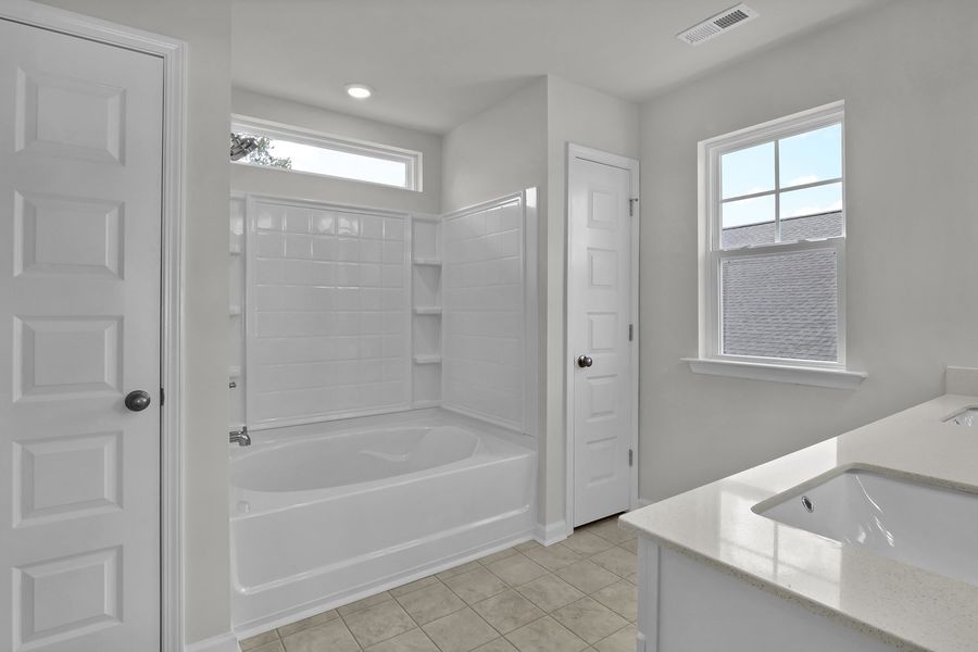 Furnished interior view inside a new home in Grand Park, Leland (Image 10). Furnished interior view inside a new home in Grand Park, Leland (Image 10).