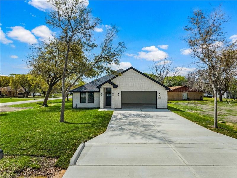 Front exterior of a new home in , Santa Fe, TX, highlighting curb appeal (Image 24). Front exterior of a new home in , Santa Fe, TX, highlighting curb appeal (Image 24).