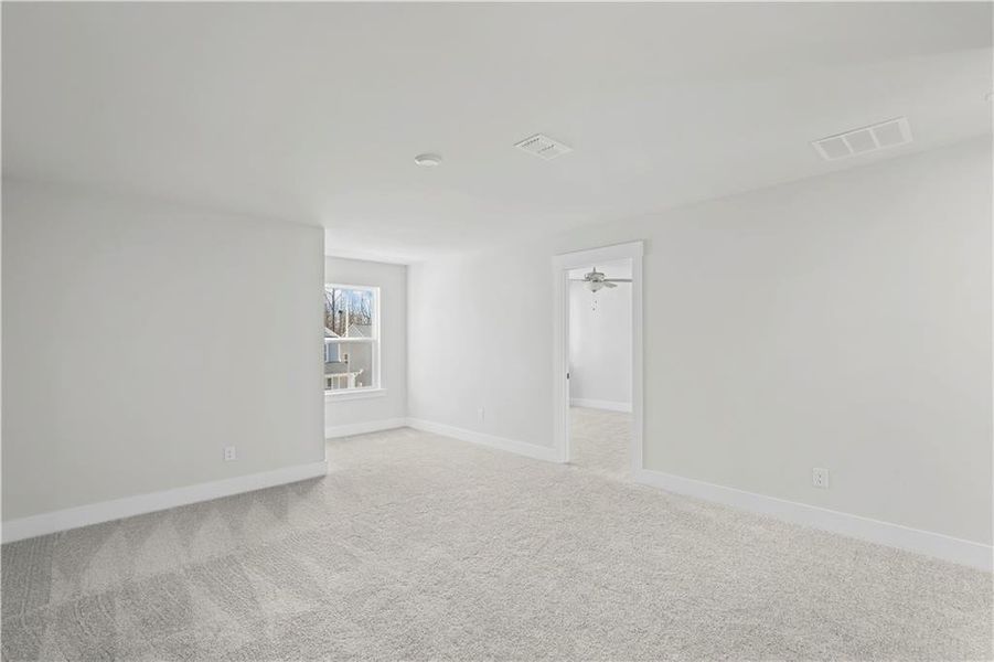Spacious, unfurnished interior of a new home in Hunters Creek, Flowery Branch (Image 23).