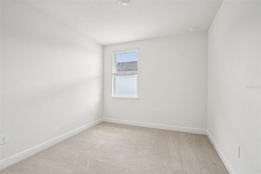 Spacious, unfurnished interior of a new home in The Reserve at Hammock Oaks - Signature Series, Lady Lake (Image 31).