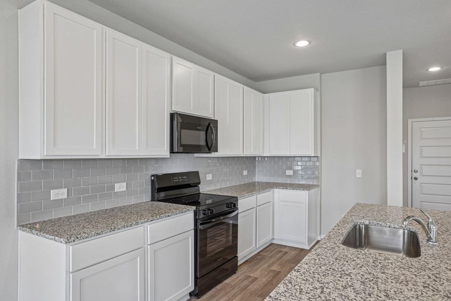 Furnished interior view inside a new home in Edgebrooke, Pflugerville (Image 8).
