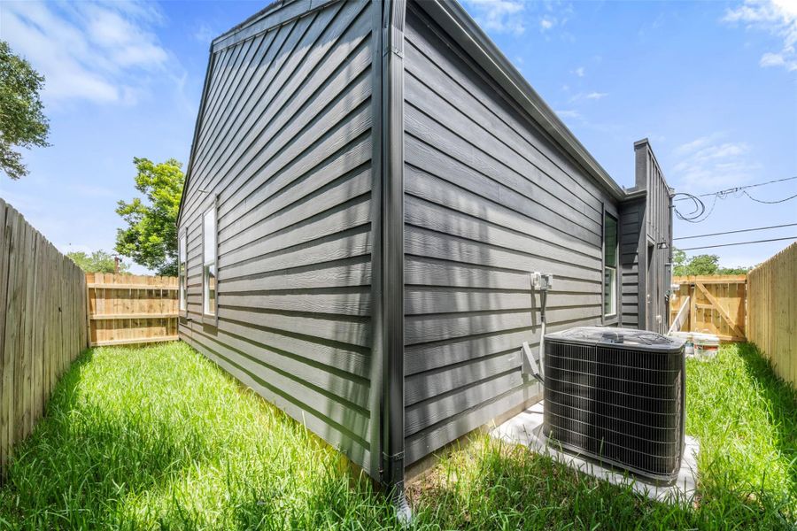 Exterior details and patio area of a home in , Houston (Image 3). Exterior details and patio area of a home in , Houston (Image 3).