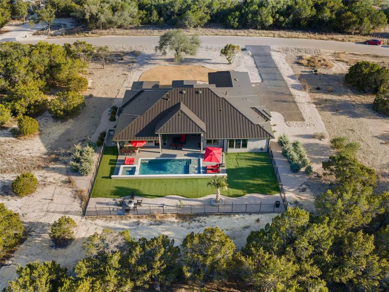 View from above of property with a pool area