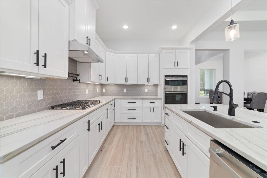 *ACTUAL HOME NOT PICTURED* This is a previously completed home in the neighborhood. Same floor plan with opposite orientation. Very similar cosmetic features will be in this home.