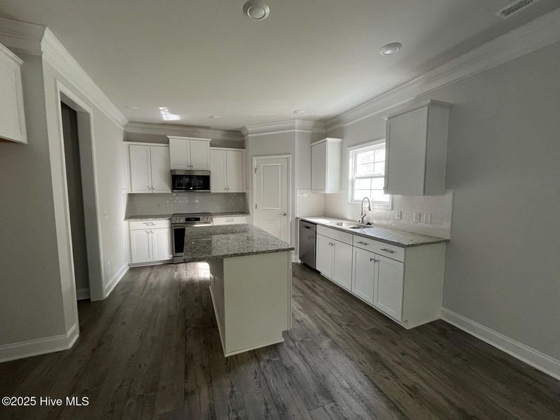 Furnished interior view inside a new home in Palmetto Creek, Bolivia (Image 7).