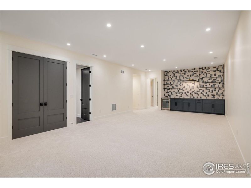 This basement Rec Room is HUGE and beautiful, too!
