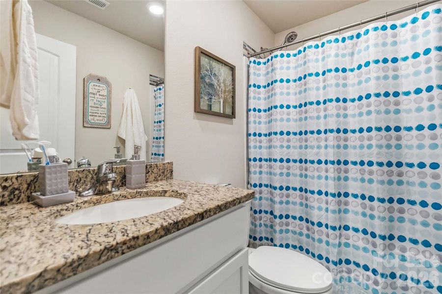 Furnished interior view inside a new home in McKee Creek Village, Charlotte (Image 31).