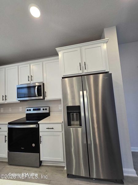 Furnished interior view inside a new home in , Jacksonville (Image 10). Furnished interior view inside a new home in , Jacksonville (Image 10).