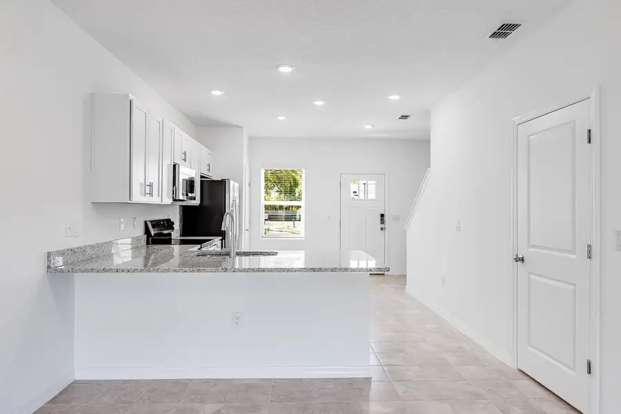 Furnished interior view inside a new home in Sabal Terrace, Jacksonville (Image 11).