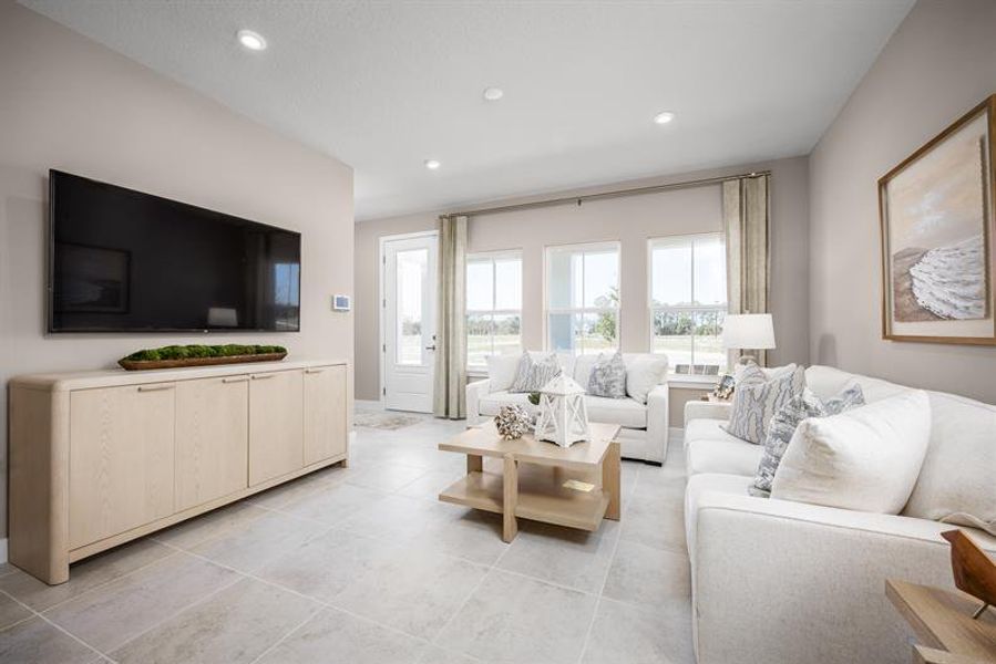 Representative furnished interior of a home built from the Allegro by Ryan Homes in Lake Mattie Preserve Townhomes, Auburndale (Image 7).