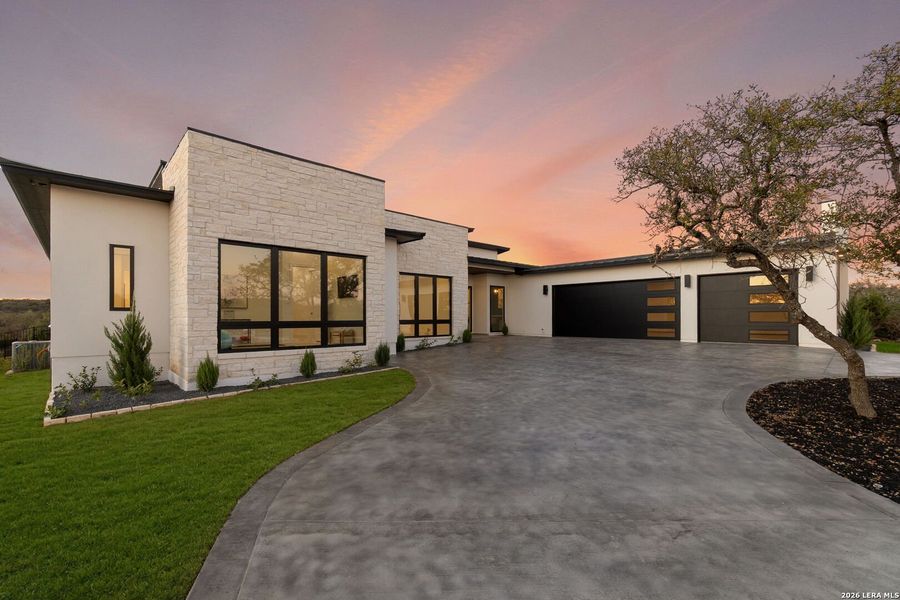 Front exterior of a new home in , Boerne, TX, highlighting curb appeal (Image 2). Front exterior of a new home in , Boerne, TX, highlighting curb appeal (Image 2).