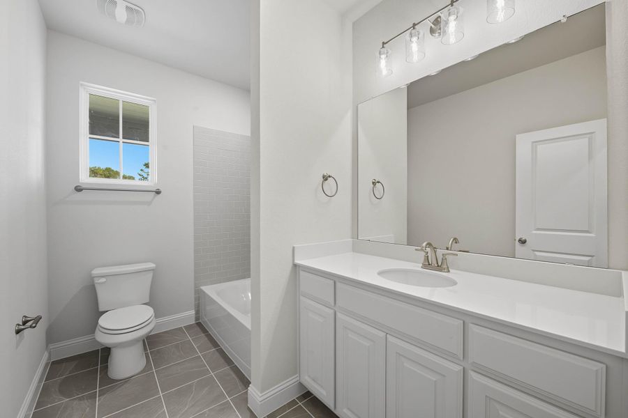 Representative furnished interior of a home built from the Garrison III by Cheldan Homes in Arbor Oaks, Boyd (Image 6).