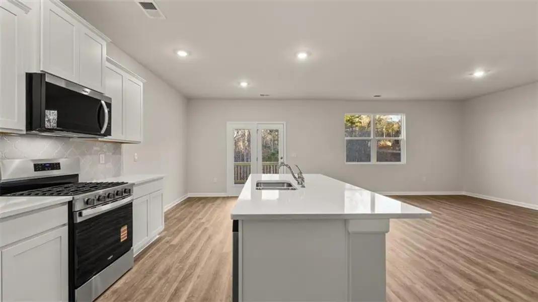 Furnished interior view inside a new home in Brooks Station, Dacula (Image 5).