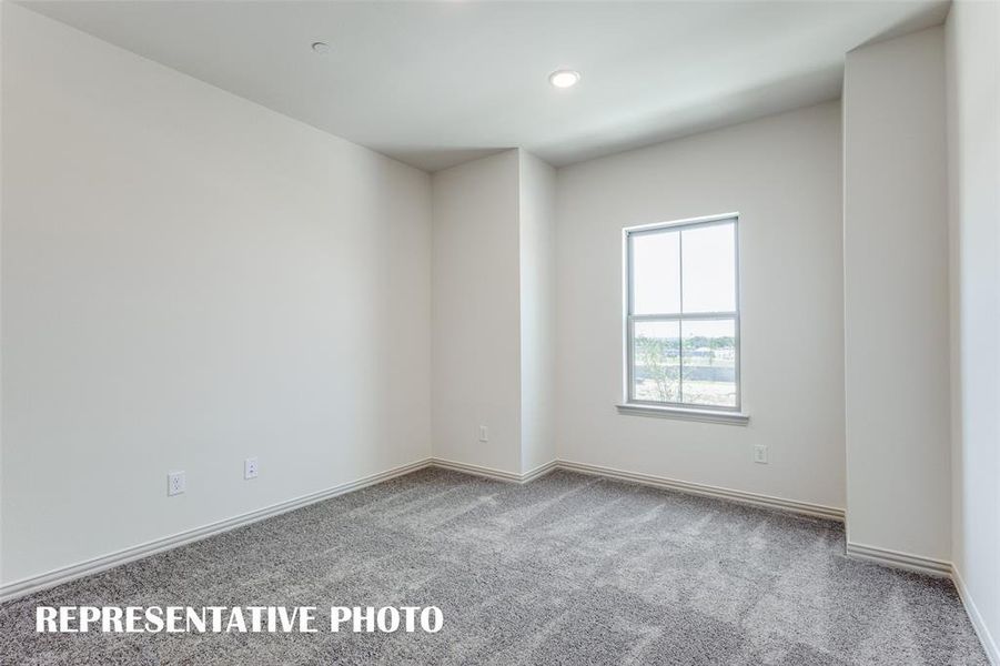 You'll find a nicely sized secondary bedroom in our Boyd floor plan.  REPRESENTATIVE PHOTO