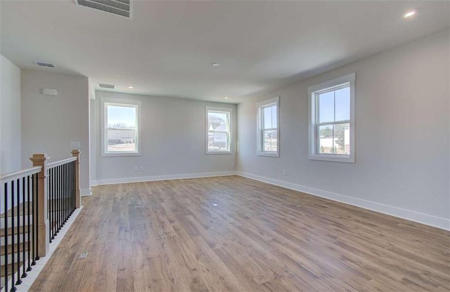 Spacious, unfurnished interior of a new home in The Paddocks at Doc Hughes, Buford (Image 20).